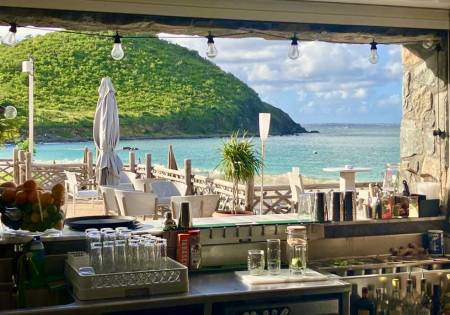 Relax at the Beach House in Saint Martin with Cocktails, DJ Sets, and feet-in-the-sand lounge vibes