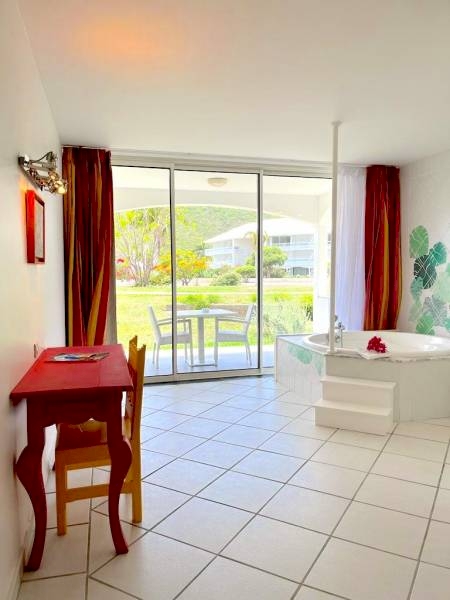 Bedroom with garden view with bathtub